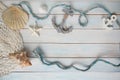 Sea Ã¢â¬â¹Ã¢â¬â¹shells, anchor, blue cord, white fishing net, starfish, pebbles, still life, summer vacation concept, trip to warm